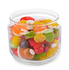 Different colorful fruit candy in jar isolated on white