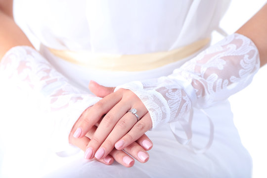 Wedding gloves on hands of bride, close-up