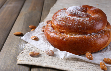 Tasty cake on table on grey background