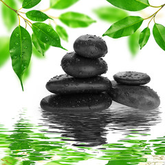 spa Background -  black stones and bamboo on water