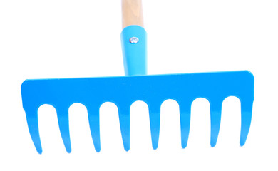 Garden rake isolated on white