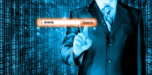 Businessman pushing virtual search bar