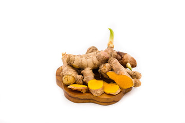 Turmeric root on white background