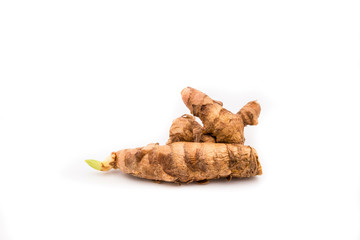Turmeric root on white background
