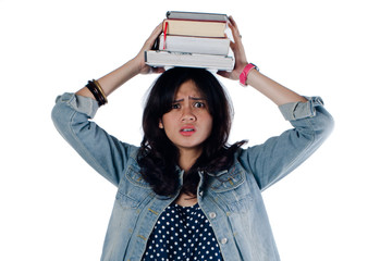 Young college girl so depressed with so many book