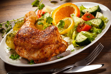Grilled chicken leg with vegetables