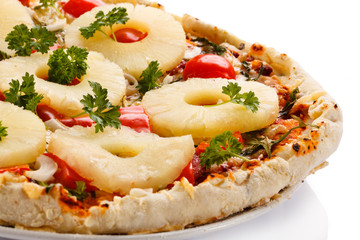 Pizza Hawaii on white background