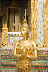 iconic golden kinnari statue in bangkok thailand