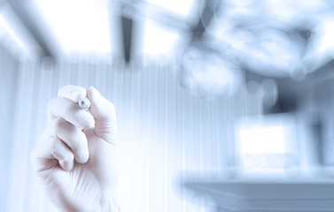 doctor hand drawing with modern computer interface as medical co
