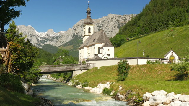 Picturesque view on church of Ramsau bavaria with alps.
