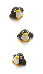 three penguin doll on white background