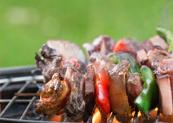 Tasty skewers on the grill.