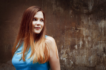 Fototapeta premium Beautiful red-haired young woman