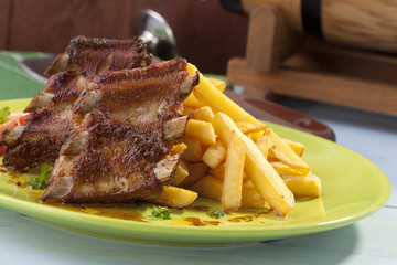Grilled ribs on plate