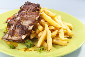 Grilled ribs on plate