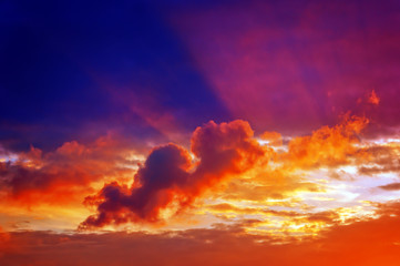 cloudscape at sunset with sun rays - obrazy, fototapety, plakaty