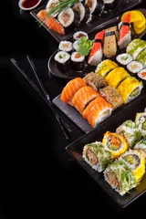 Deurstickers Delicious sushi pieces on black background © Jag_cz