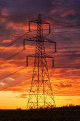 Power supply under apocalyptic looking skies © allouphoto