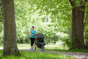 Young woman with a stroller