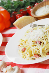 Pasta carbonara on the wooden table