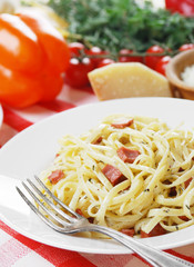 Pasta carbonara on the wooden table