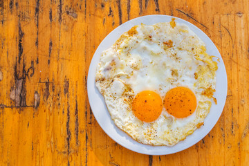 Two of fire eggs  on wooden background