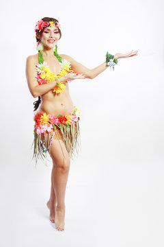 girl with Hawaiian accessories inviting