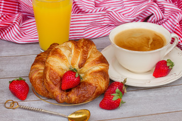 breakfast with croissants and coffee
