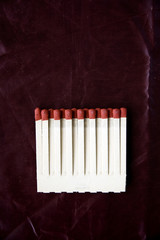 matches on deep red background