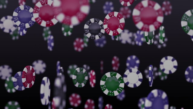 An array of casino chips swirling randomly around each other