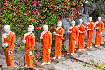 Buddhist monk statues going to Gold Buddha temple, Dambulla, Sri