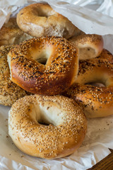 Variety of New York style bagels in paper bag