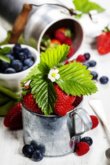 Fresh Berries on Wooden Background.