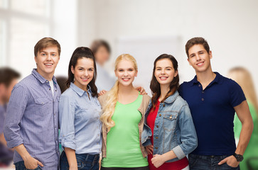 group of standing smiling students