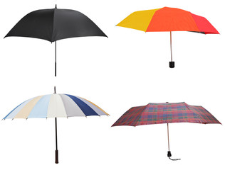 Obraz premium side view of four different open umbrellas