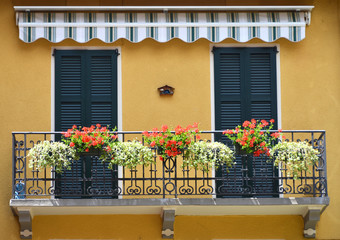 Fototapeta na wymiar Traditional Italian balcony. Cernobbio, Italy
