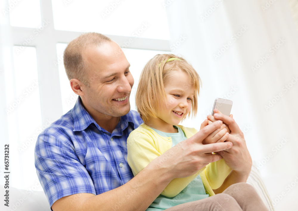 Canvas Prints happy father and daughter with smartphone