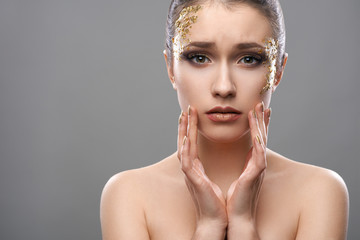 pretty girl with golden make-up art