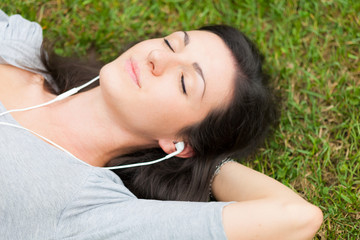 Relaxed woman listening music