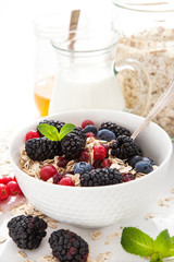 Healthy breakfast with granola and fresh berries