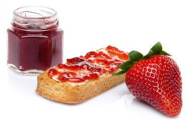 Fresh strawberry, jam and a crisp toast