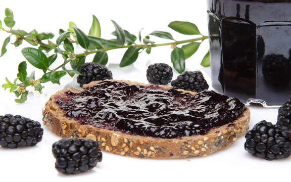 Toast with blackberry jam and fresh blackberries