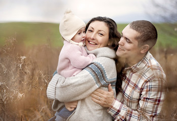 Fototapeta premium Family relaxing together in autumn nature