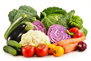 Variety of fresh organic vegetables isolated on white