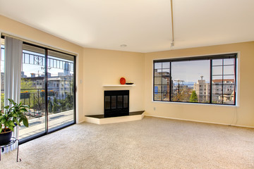 Empty living room with walkout deck