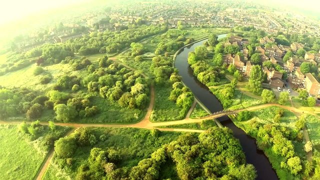 Aerial view over houses in the English countrysideStock video: C