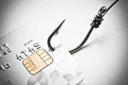 phishing - fish hook and credit card