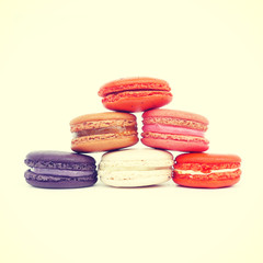 Obraz na płótnie Canvas Sweet and colourful french macarons retro-vintage style