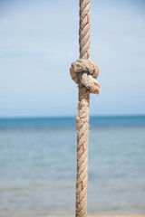 knot on the rope and sea