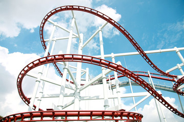 Roller of coaster against blue sky.
